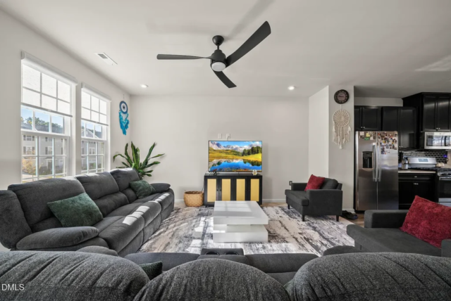 Spacious living area in modern 2023 Raleigh townhome