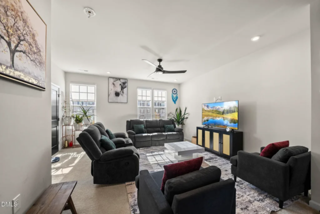 Spacious living area in modern 2023 Raleigh townhome