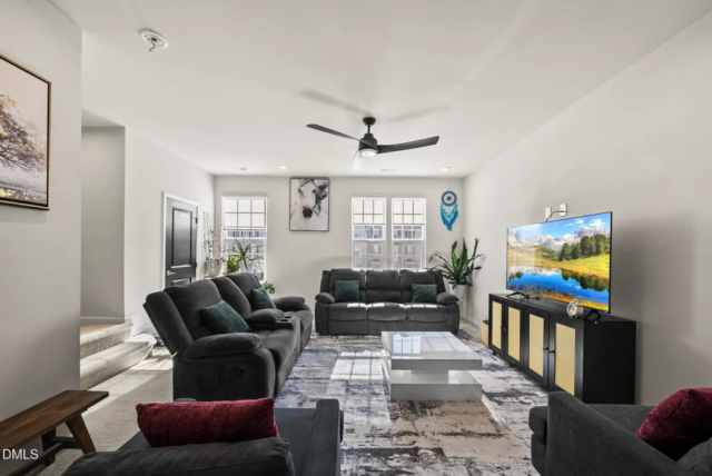 Spacious living area in modern 2023 Raleigh townhome