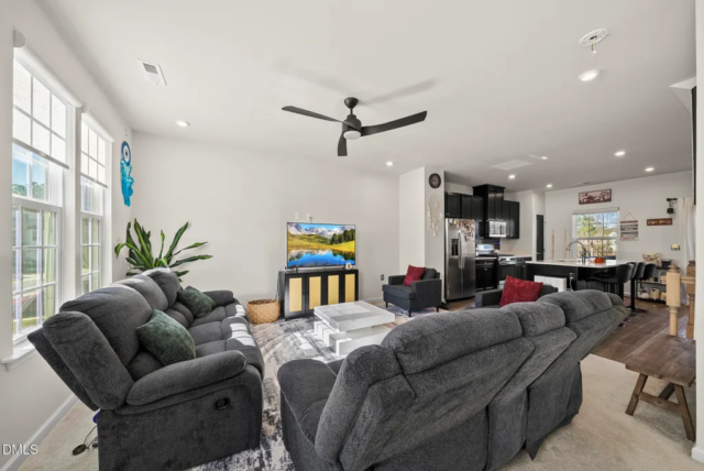 Spacious living area in modern 2023 Raleigh townhome